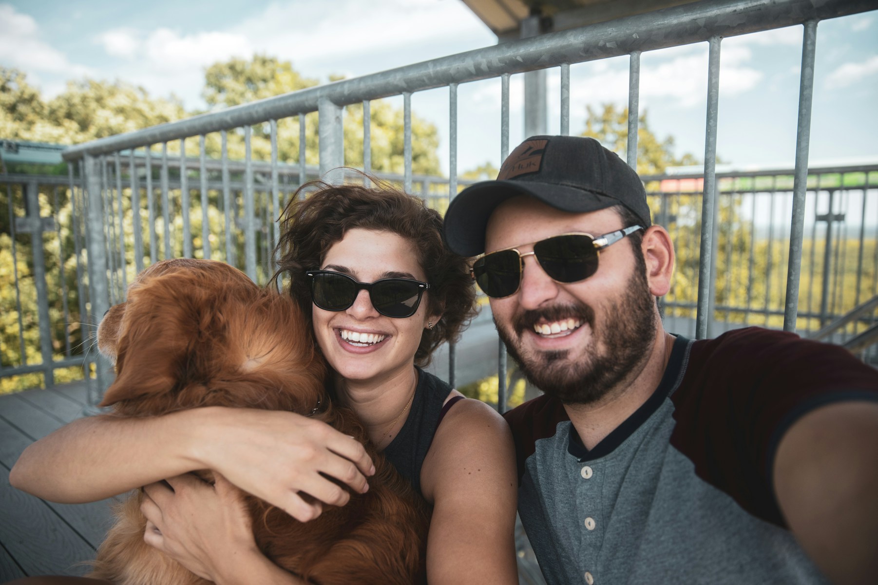 Happy couple with a dog